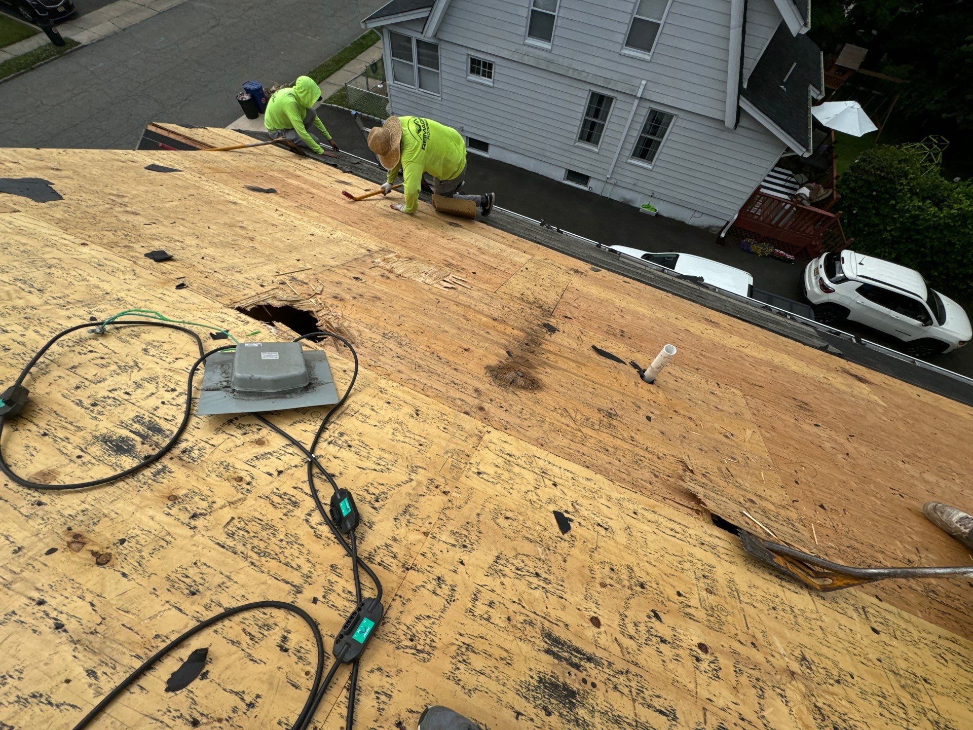 Charcoal Shingles by Reimagine Roofing