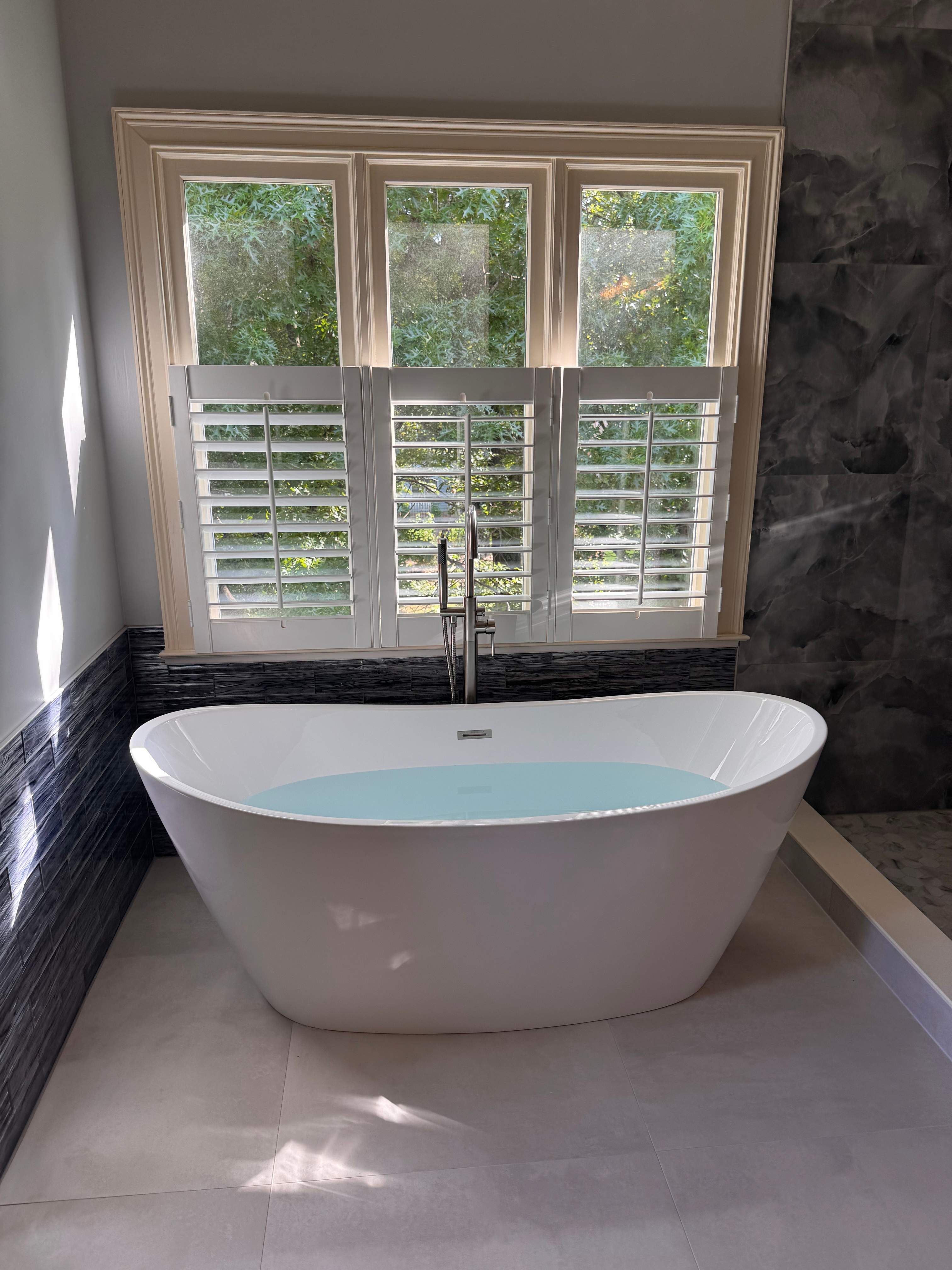 Master bathroom renovation using Free standing tub by Prudencio