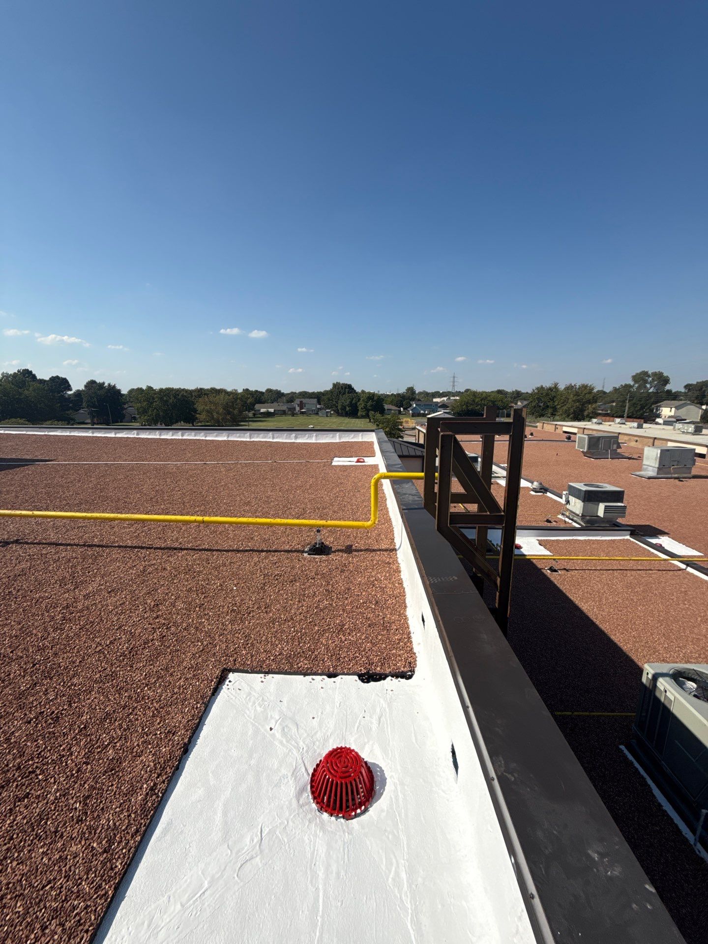 Mills Elementary School Commercial Re-Roof and Moisture Protection by Secondary Rhodes