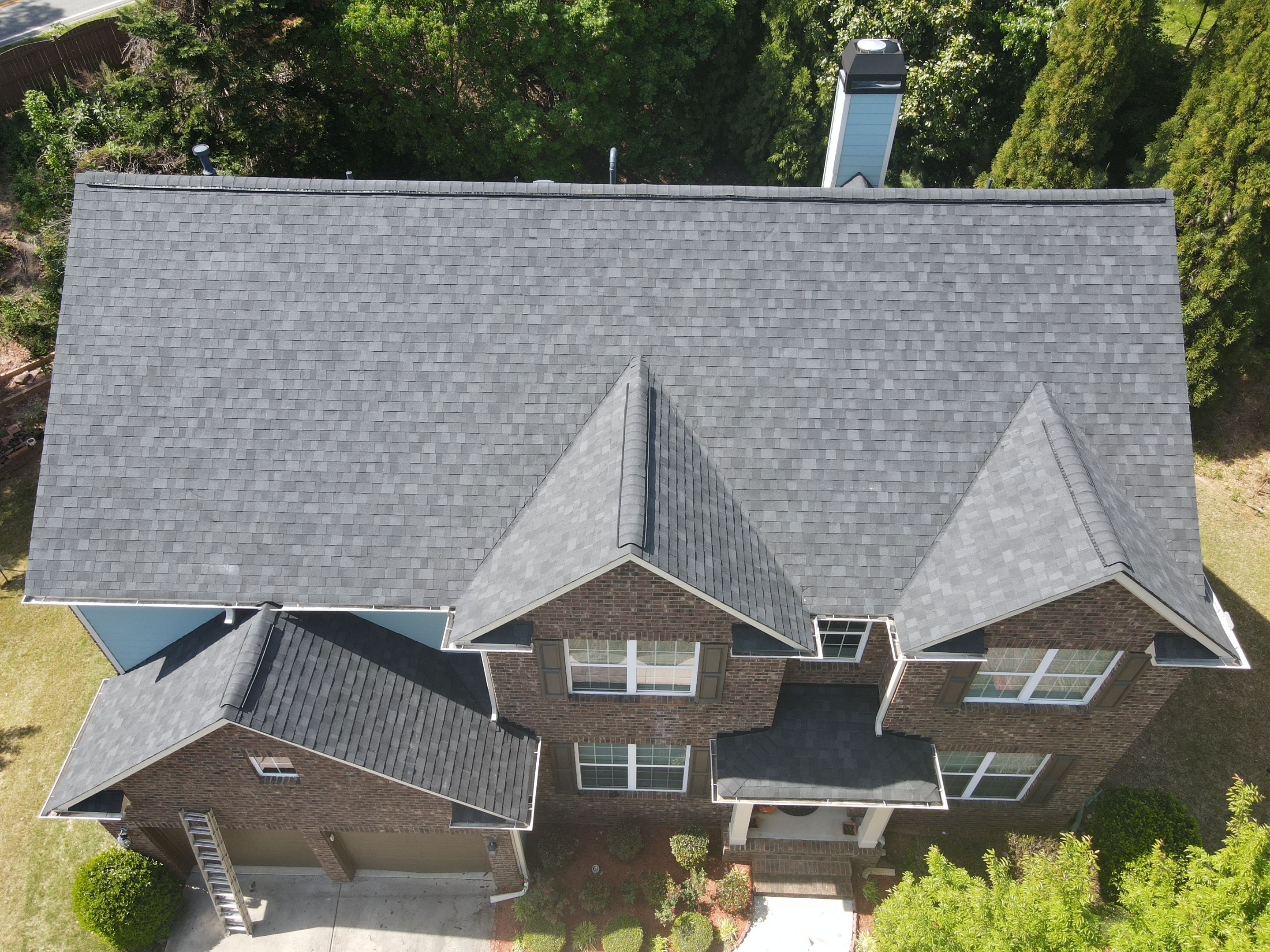 Residential Roofing Installation using Owens Corning Onyx Black by Inspector Roofing and Restoration