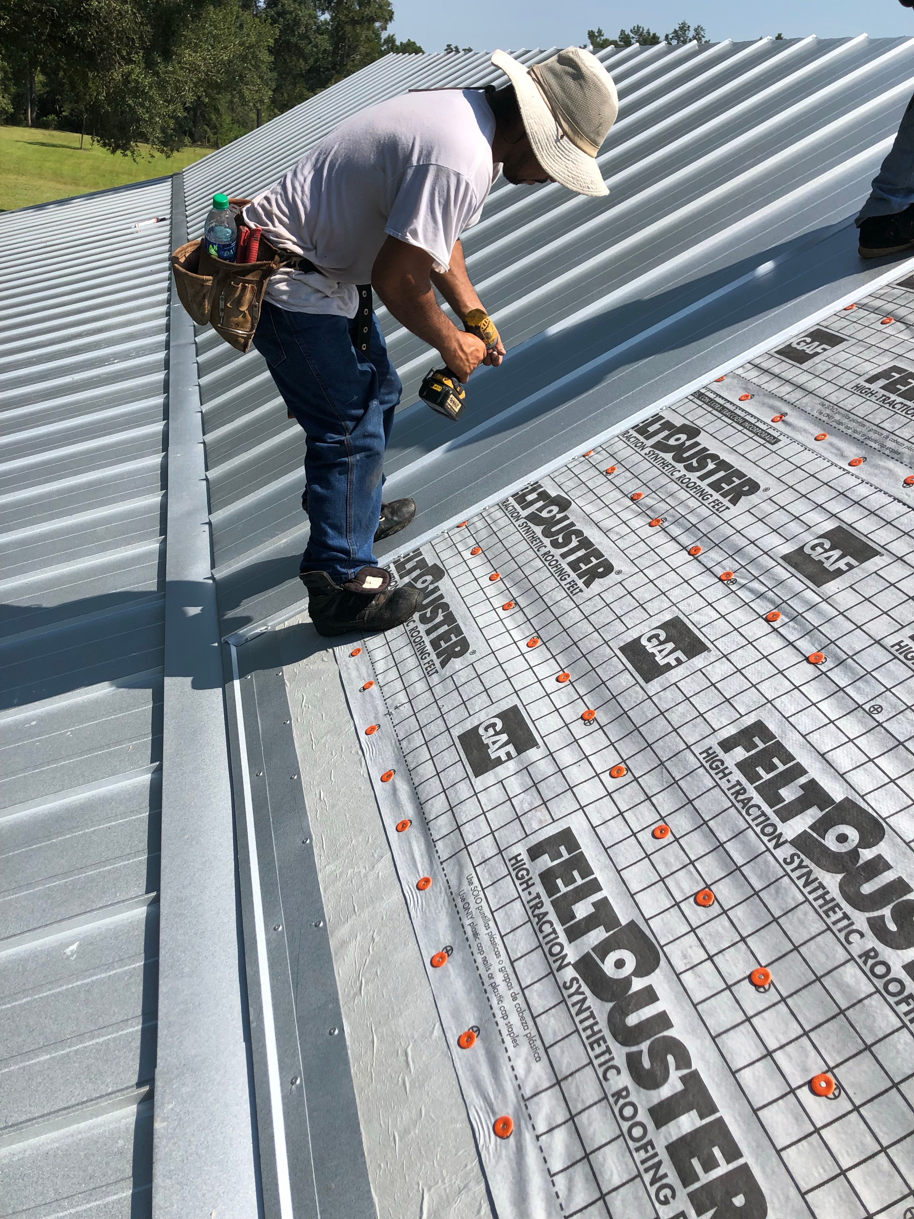 Residential Roofing Installation using Metal roofing by American Roofing & Construction LLC