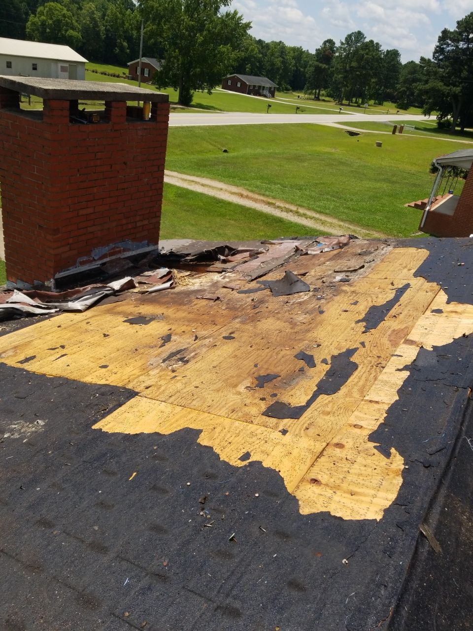 Re-roof by American Roofing NC