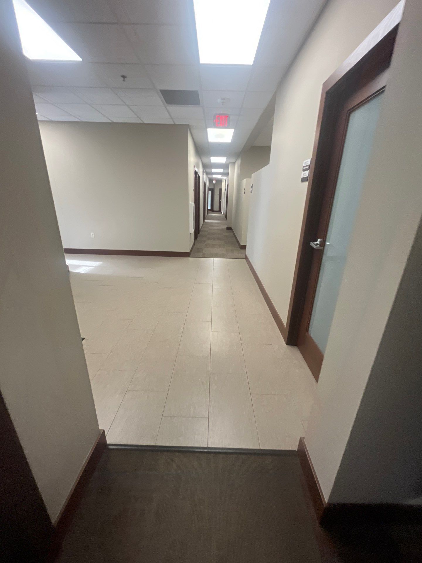 Commercial Office Interior Remodel and Modern Suite Refresh in Sioux Falls by Select Painting, Coatings & Garage Cabinets