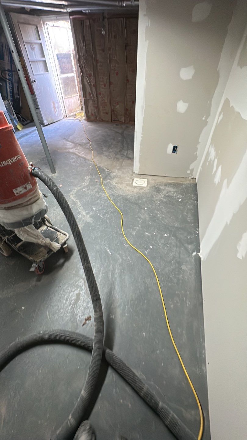 Basement, Bar & Laundry area  by Floors in a Day, Inc