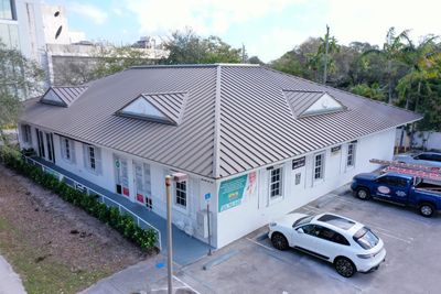 COMMERCIAL REROOF 24 GUAGE MEDIUM BRONZE 1-1/2" MECHANICAL SEAM "ZEBRA METHOD"