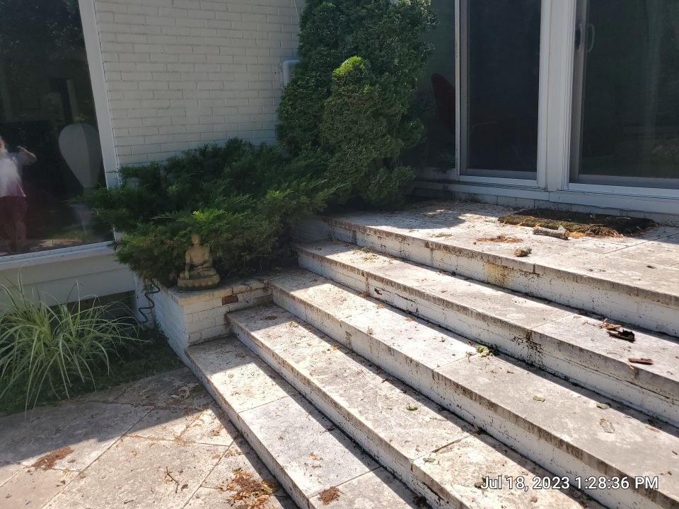 marble patio cleaning and sanding using Polysweep polymeric sand by Northern Power Washing LLC.