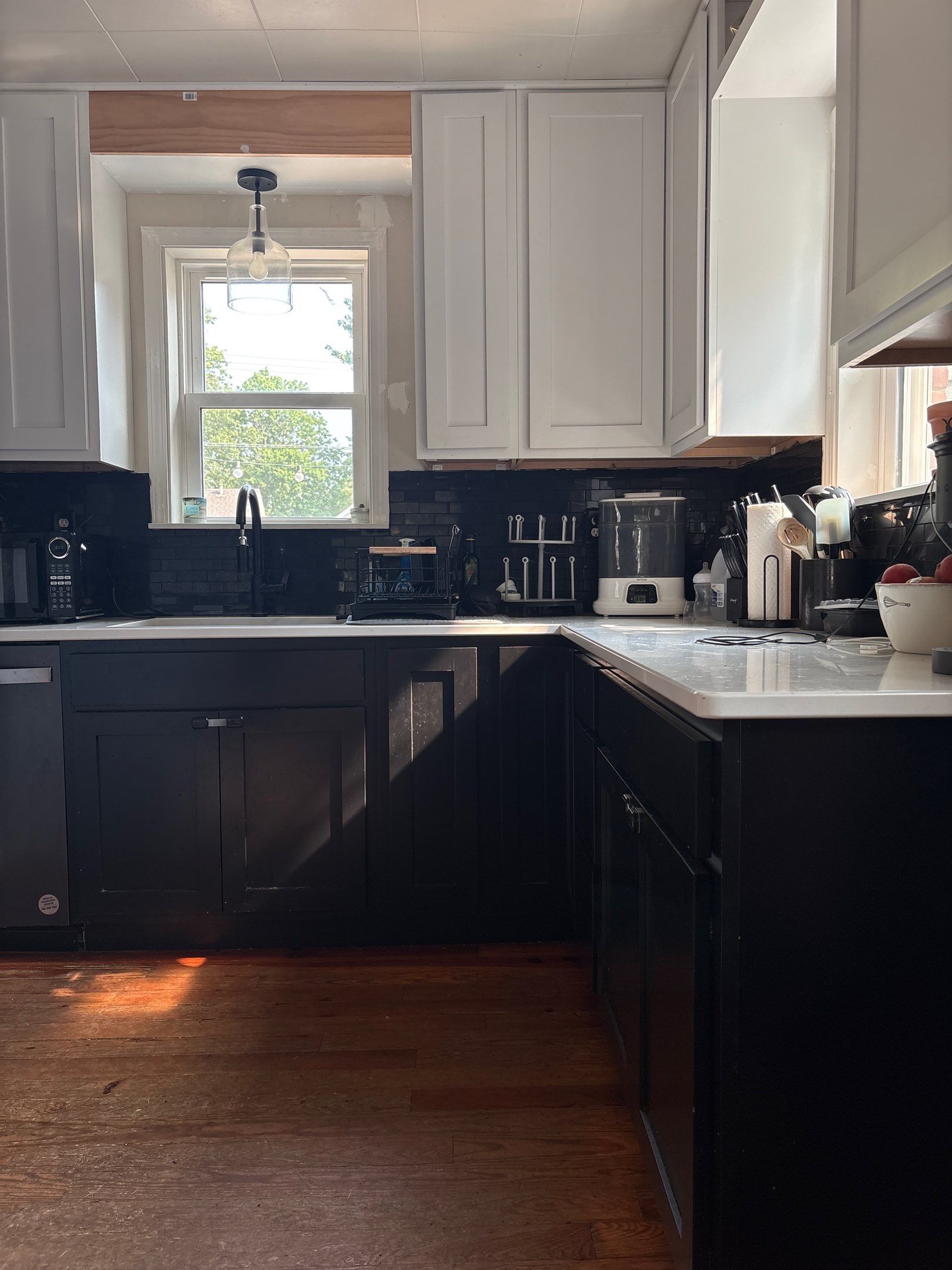 Lincoln Kitchen Remodel With Black and White Two-Tone Cabinetry by CompanyCam Sales Demo