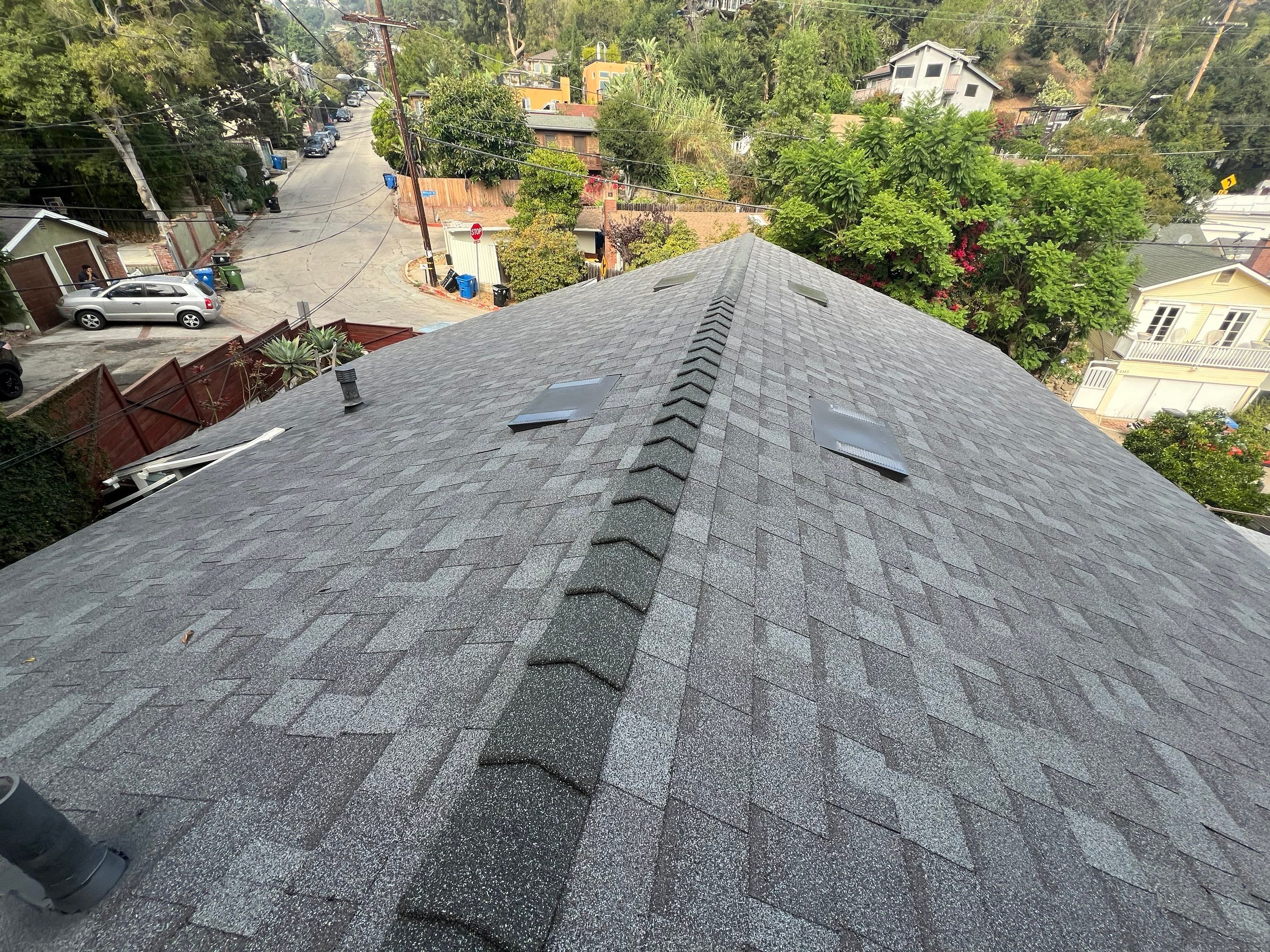 Residential Roofing Installation using Shingles and Silicone by Hull Brothers Roofing