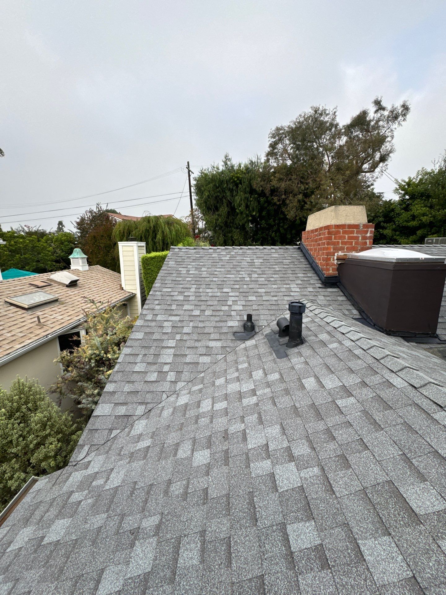 Residential Roofing Installation using Shingles and Silicone by Hull Brothers Roofing
