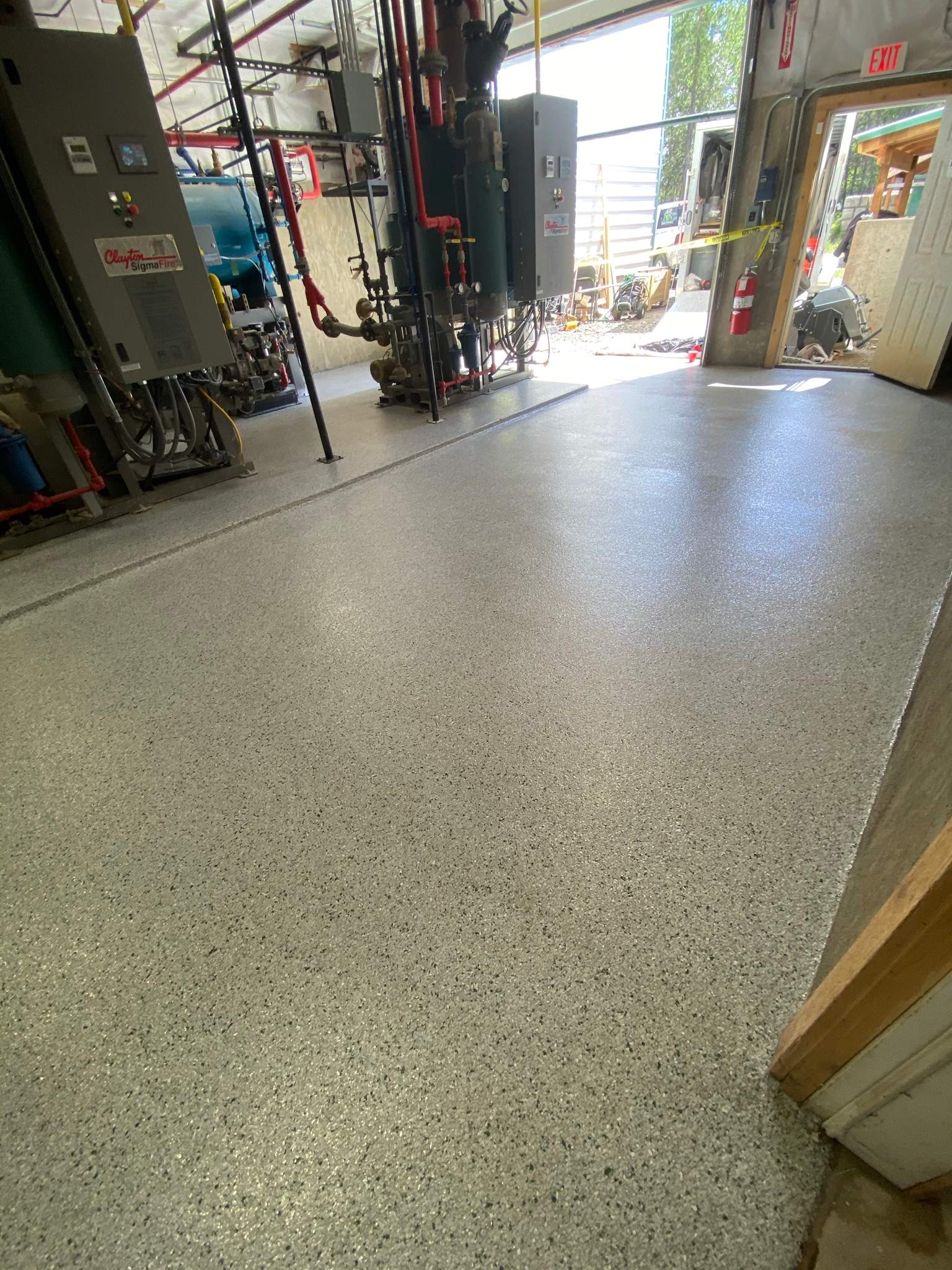 Commercial Floor Transformation using North Pole with Green by Croc Coatings, LLC