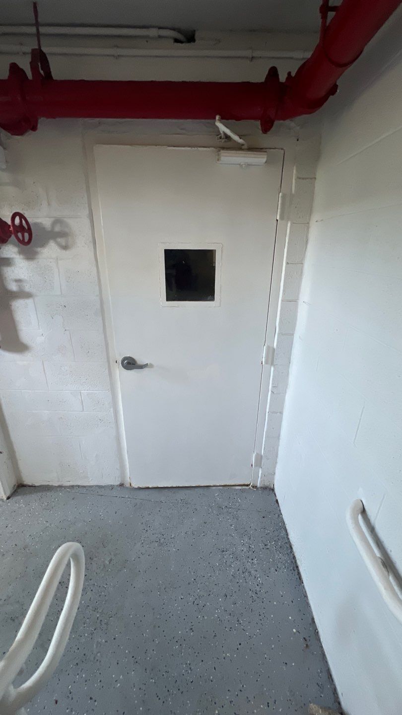 Commercial Stairwell Door Replacement & Hollow Metal Door Retrofit – Pompano Beach High-Rise by The Door Doctor of South Florida, Inc.