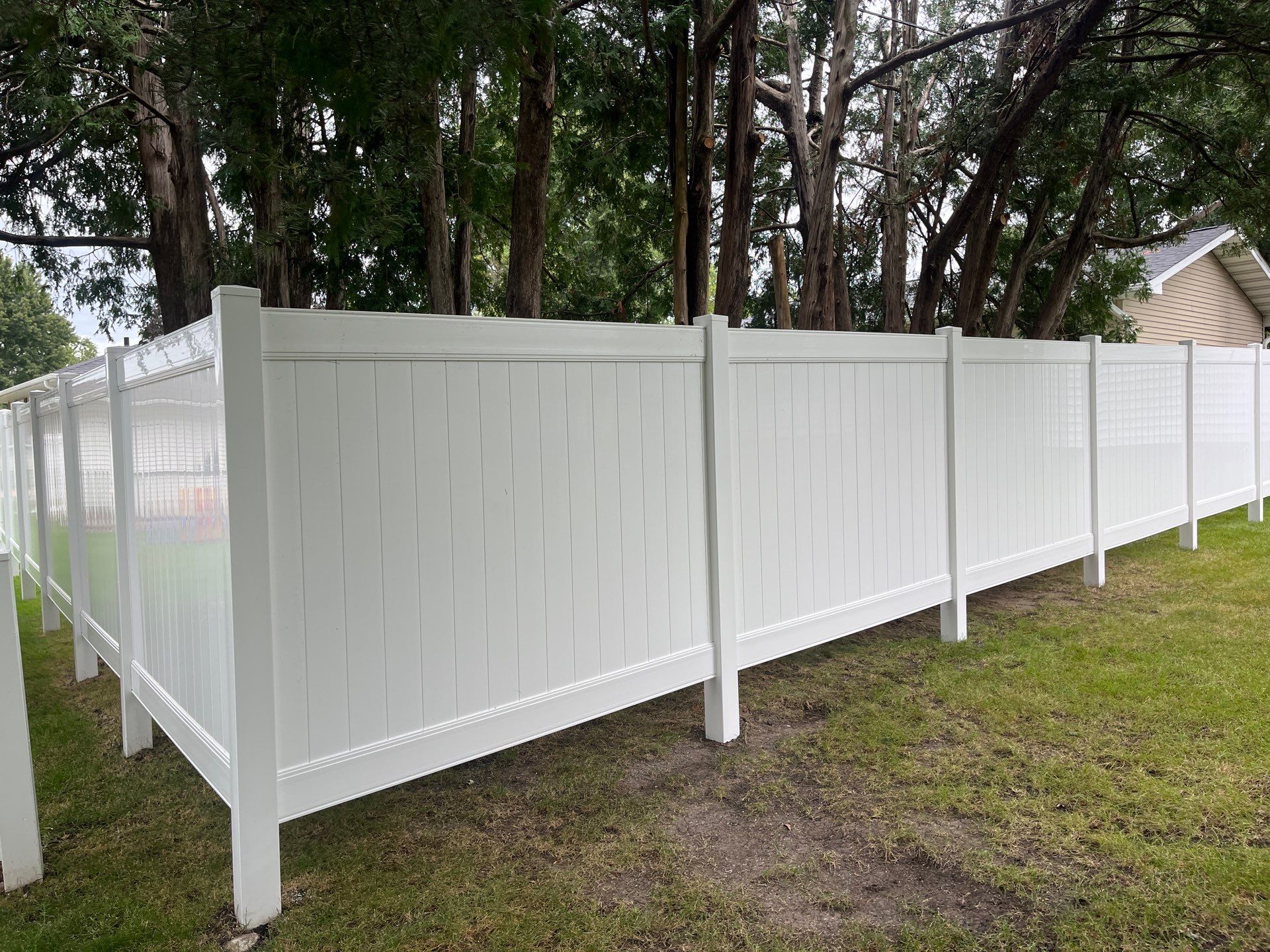 Residential White Vinyl Privacy Fence Enclosure in Waterloo by Perfect Picket Fence and Stain