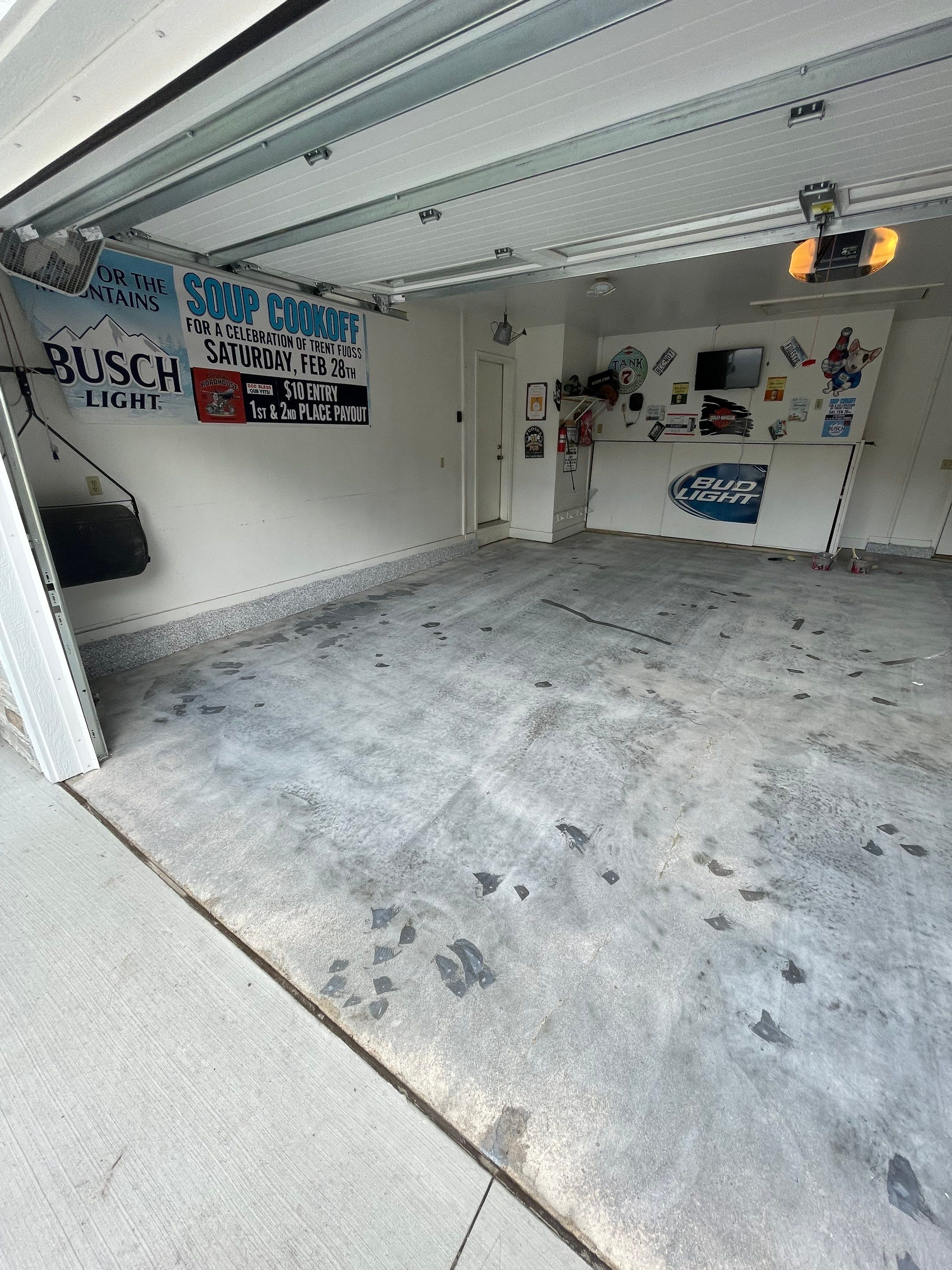 Residential Garage Floor Coating with Feather Grey Finish in Sioux Falls by Select Painting, Coatings & Garage Cabinets