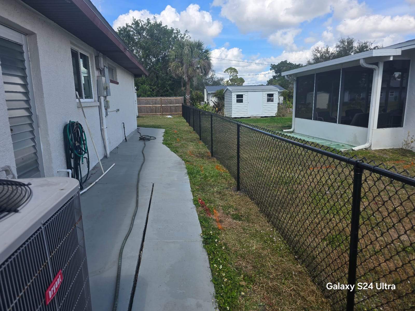 Black Chain Link Fence Installation for Port Charlotte Residence by True Fence LLC
