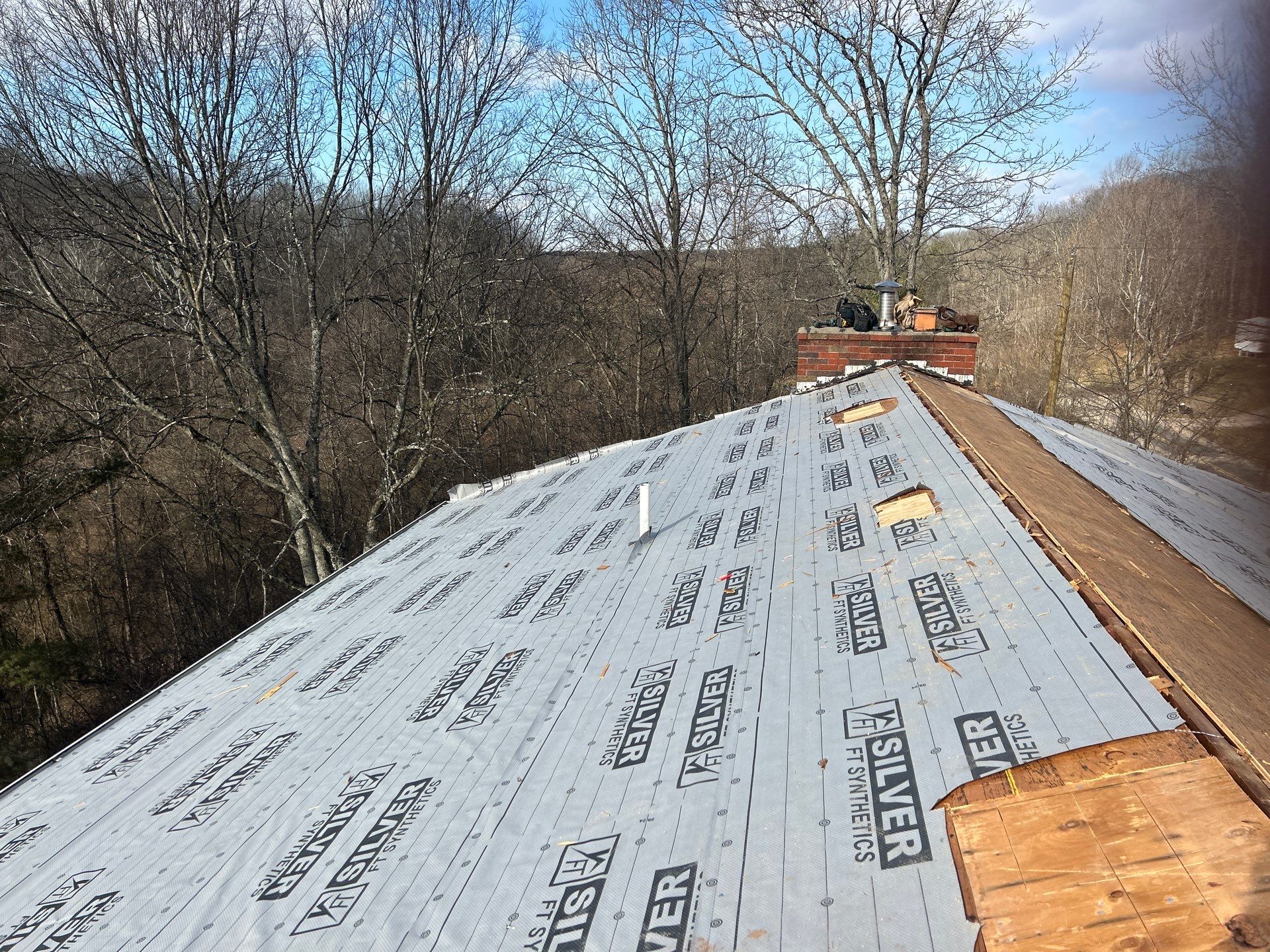 Residential Roofing Installation using Metal by Rainstoppers Roofing