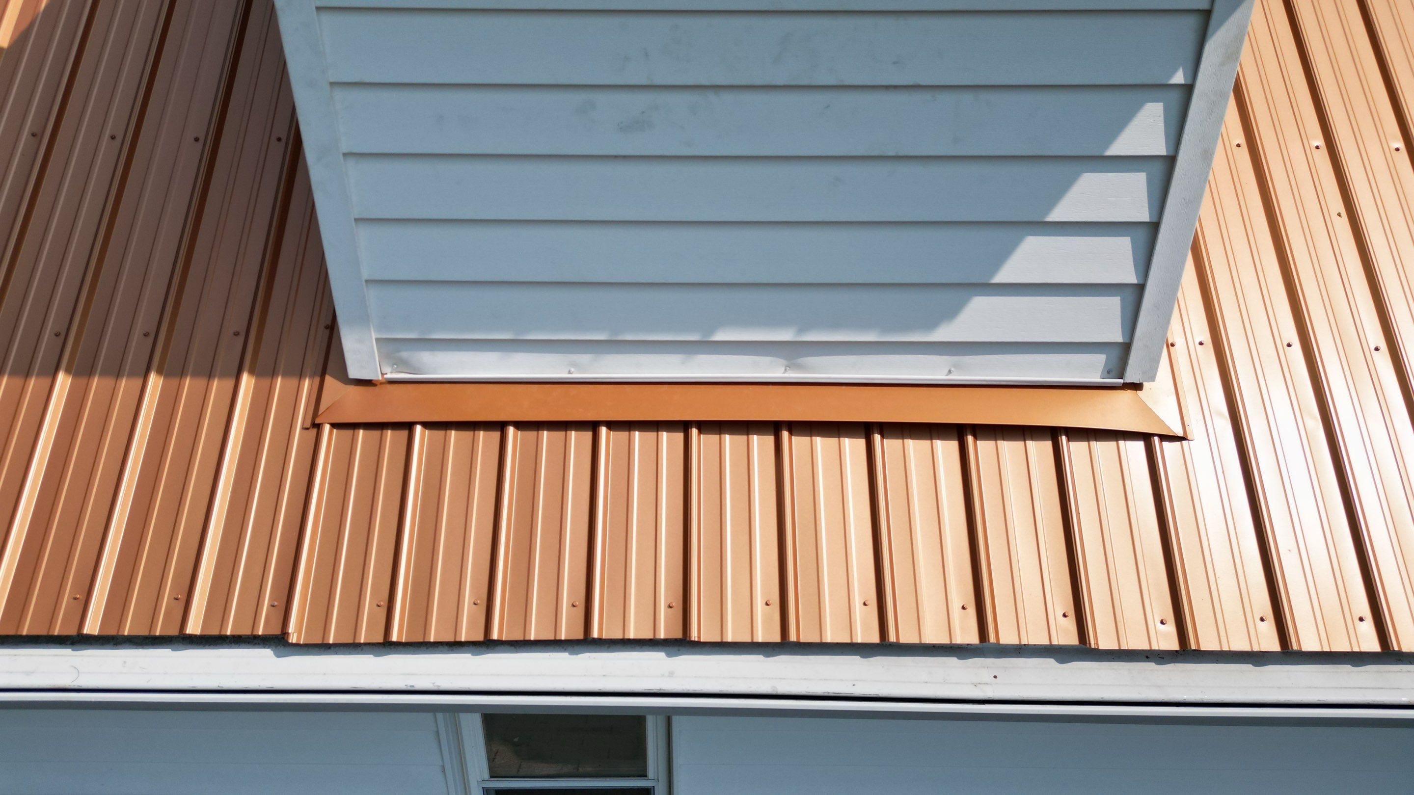 Residential Roofing Installation using Performance Panel Metal - Copper Metallic by RoofX 