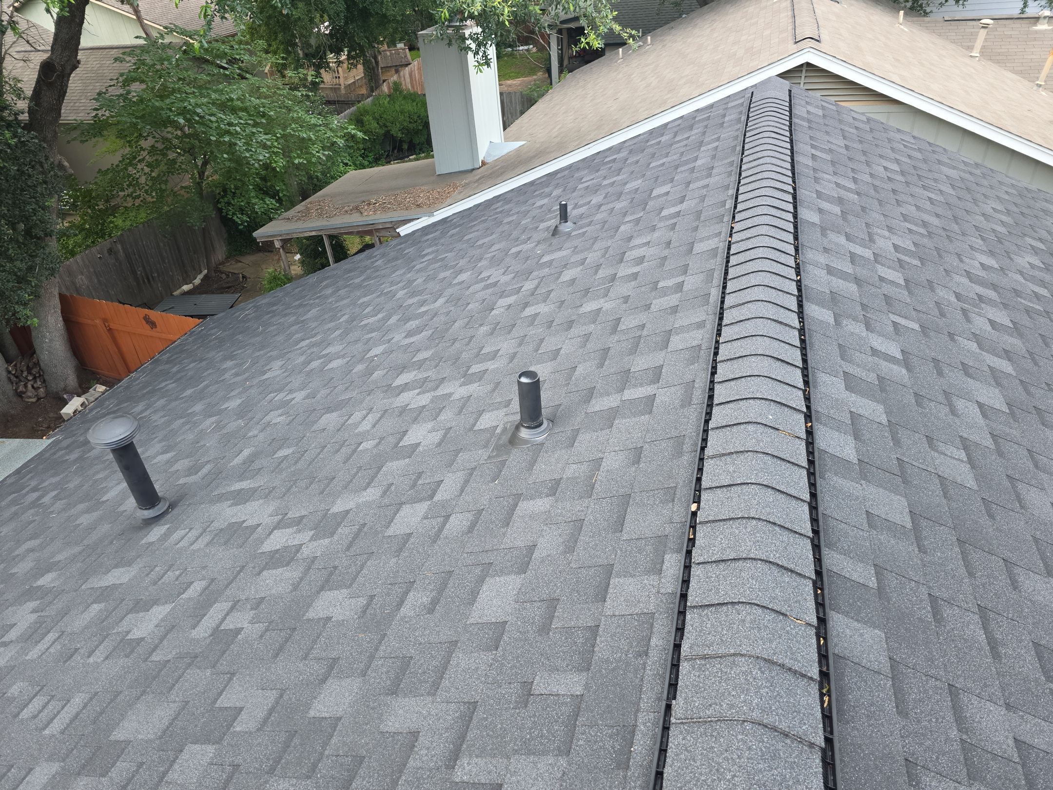 Architectural Shingle Roofing Replacement and Gutter Restoration in Austin by Caliber Restoration LLC