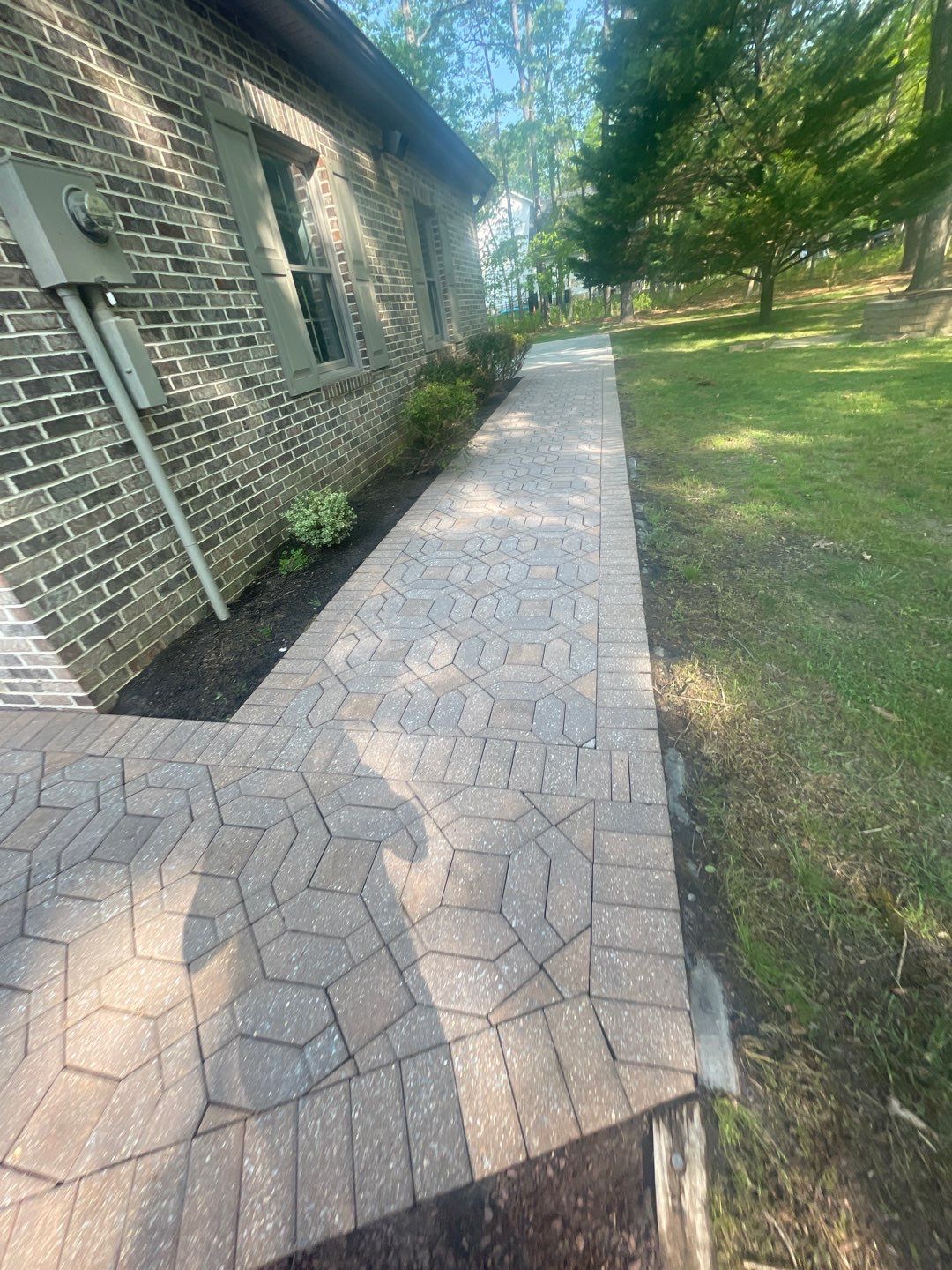 Pavers Cleaned, Garage and Concrete walls by SJ Exterior