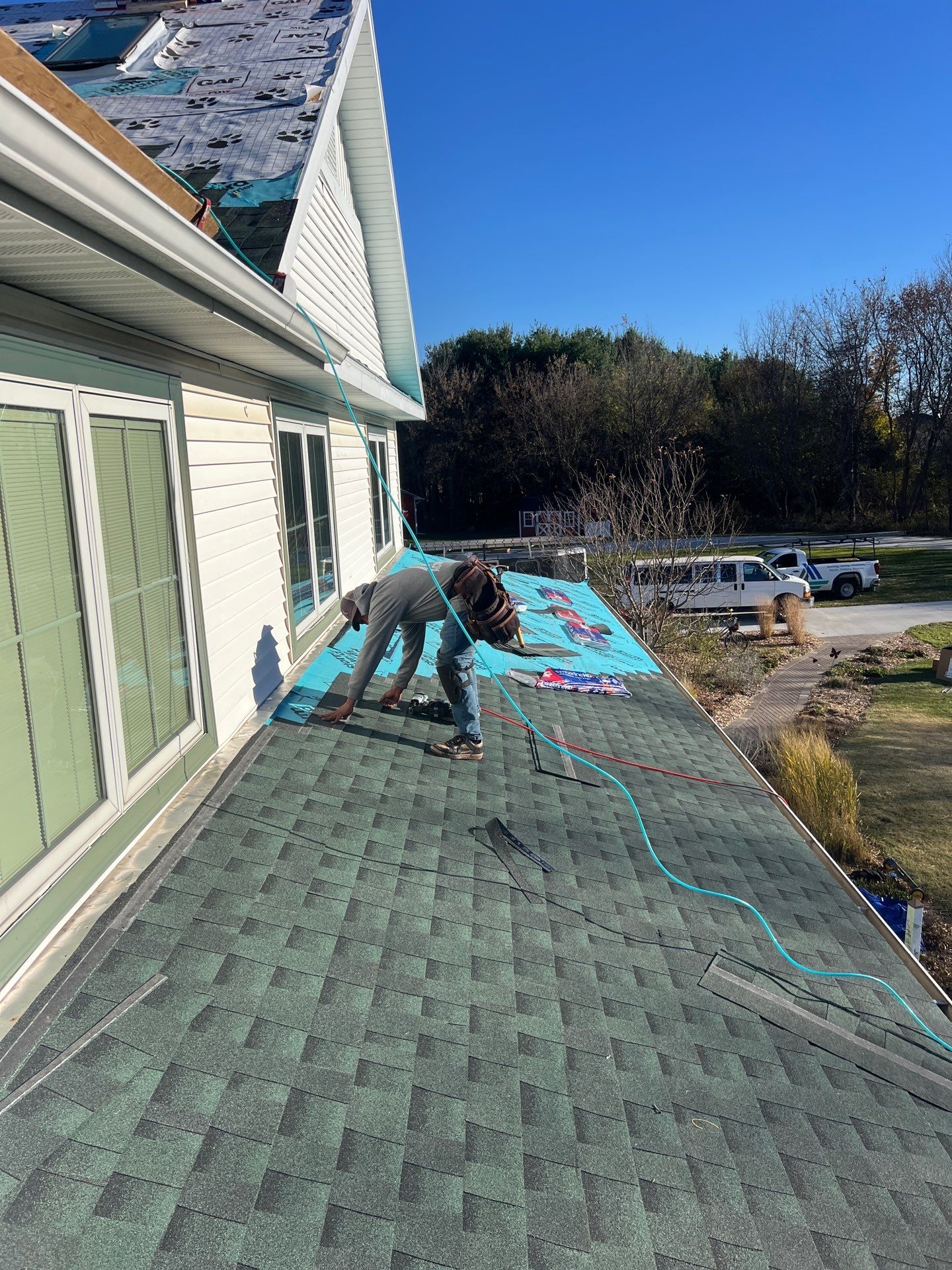 Residential Roofing Replacement with Multiple Skylights in Mason, Michigan by Acme Exteriors