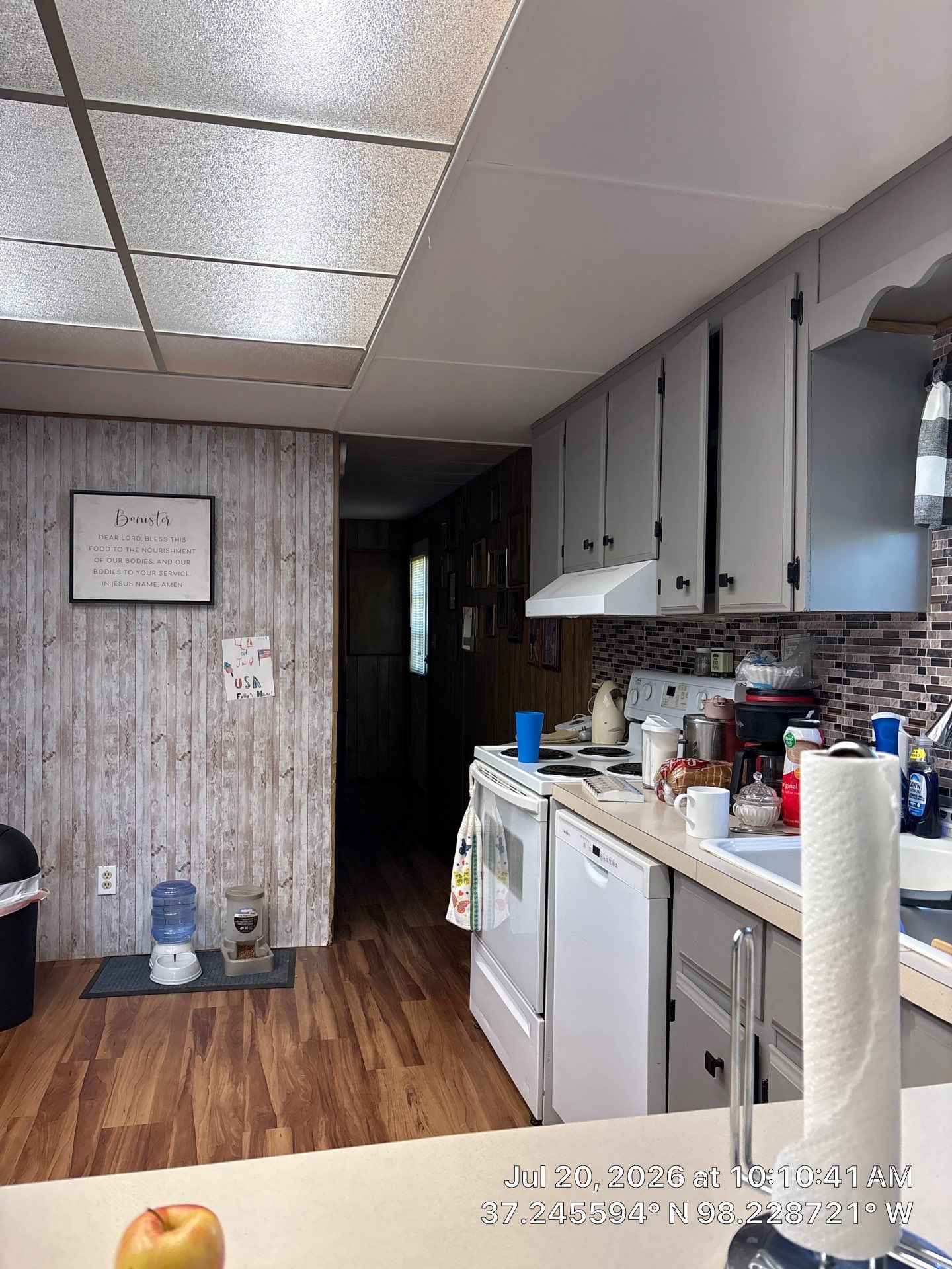 Kitchen Remodel Featuring Gray Cabinets and Laminate Flooring in Attica by CompanyCam Sales Demo