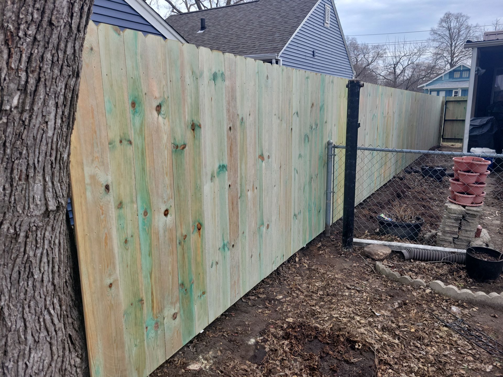 Custom Wood Privacy Fence and Gate Installation in Waterloo by Perfect Picket Fence and Stain