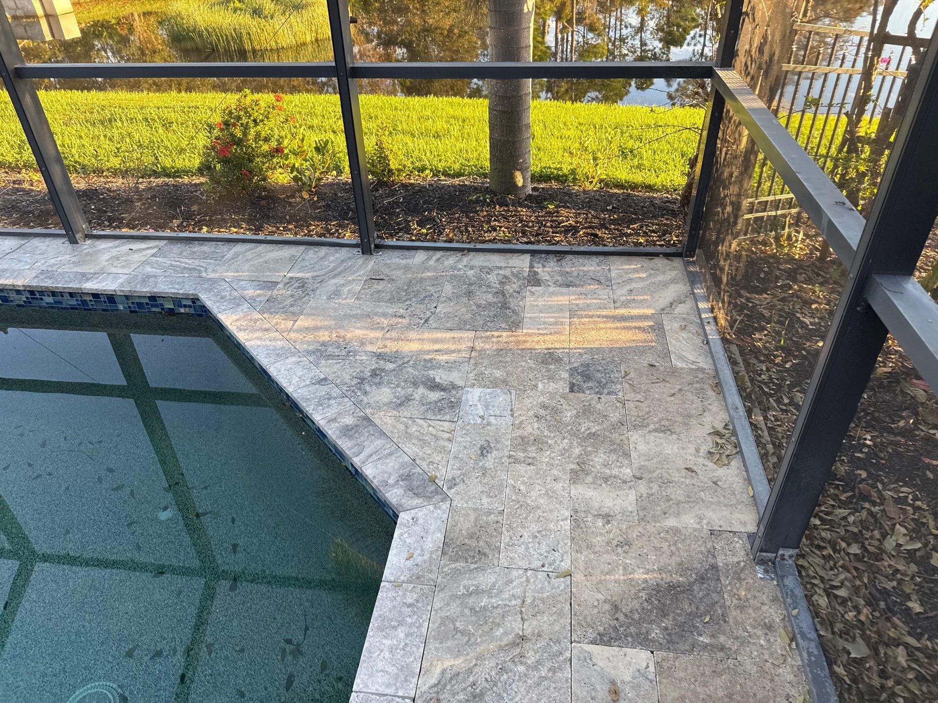 Travertine Pool Deck and Screen Enclosure Cleaning in Ellenton, FL | Oakleaf Hammock Community by Sunshine AquaWash
