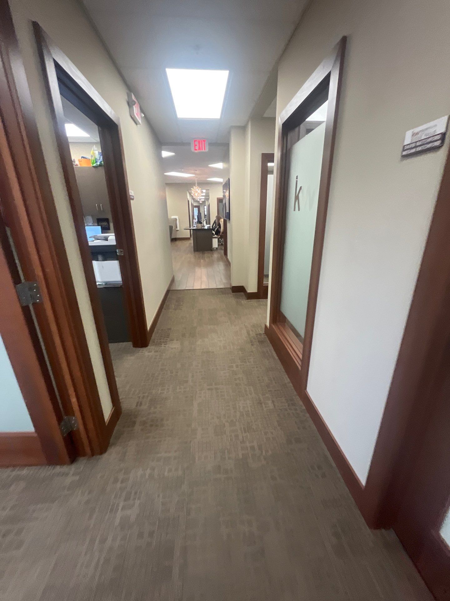 Commercial Office Interior Remodel and Modern Suite Refresh in Sioux Falls by Select Painting, Coatings & Garage Cabinets