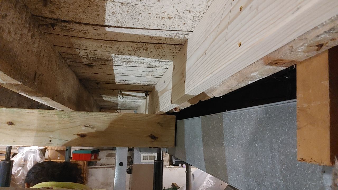 Structural Wood Reinforcement using Structural Wood and Steel Reinforcements (Main Floor Joist) by Toledo Basement Repair