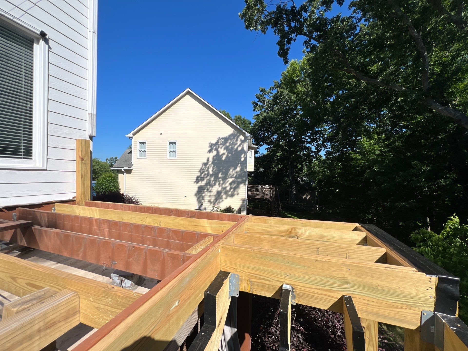 Elevated Composite Deck and Concrete Landing Installation in Kennesaw by Swift Home Renovations