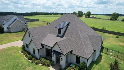 Architectural Shingle and Standing Seam Metal Roof Installation in Mount Selman