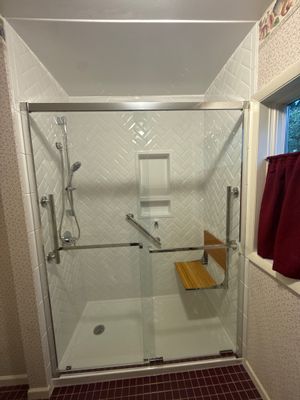 Walk-In Shower Remodel with Herringbone Tiles in Traverse City
