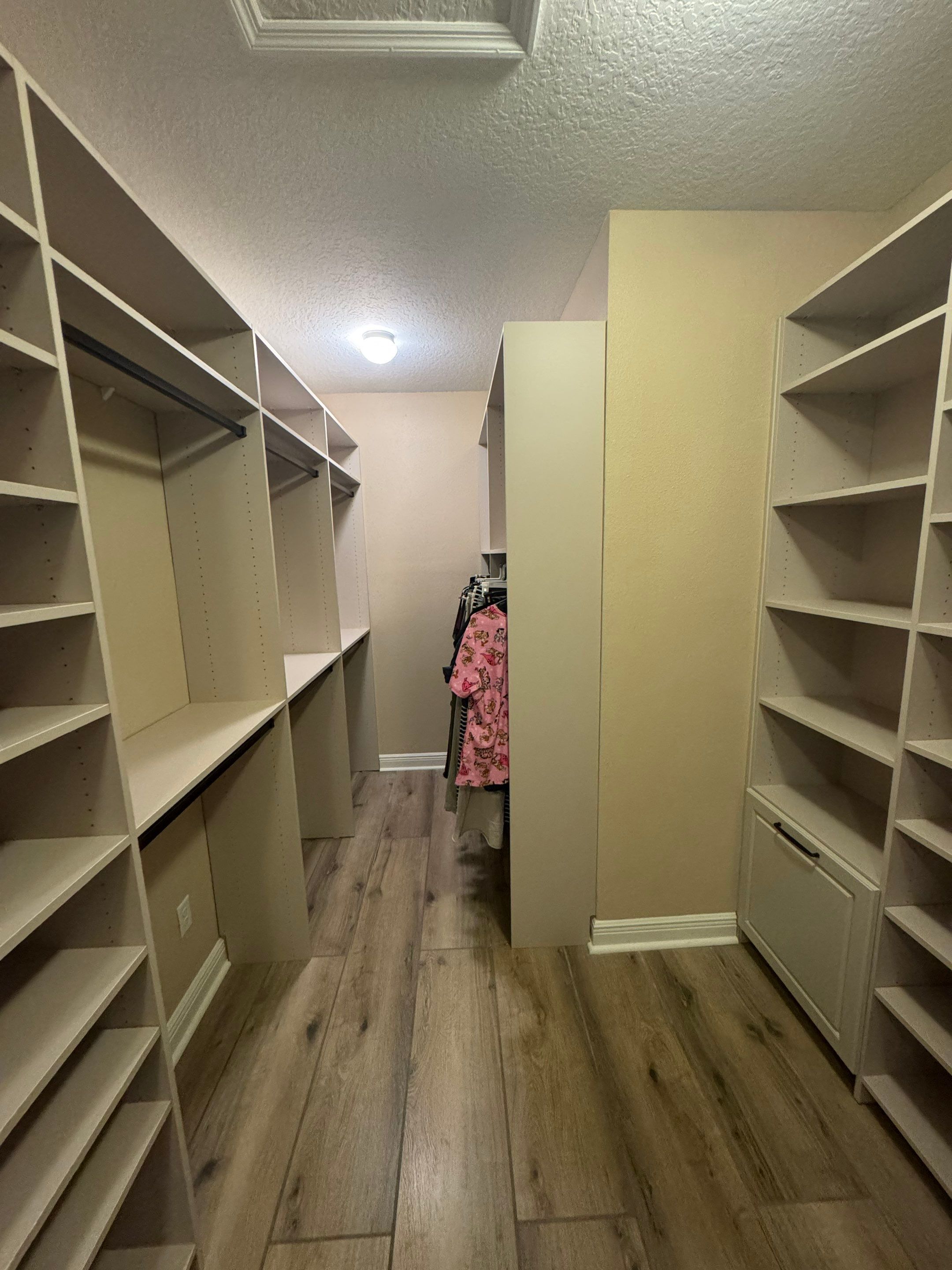 Custom Closet Storage Systems and Laminate Cabinetry Installation in Oldsmar by Square 1 Garage and Closet Solutions