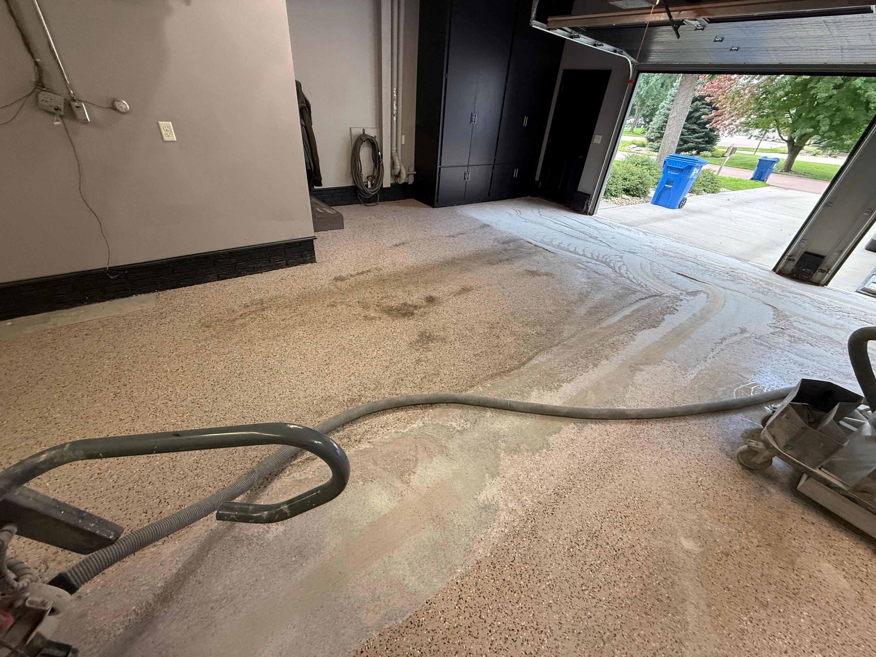 Garage Floor and Textured Pool Deck Coating in Sioux Falls by Select Painting, Coatings & Garage Cabinets