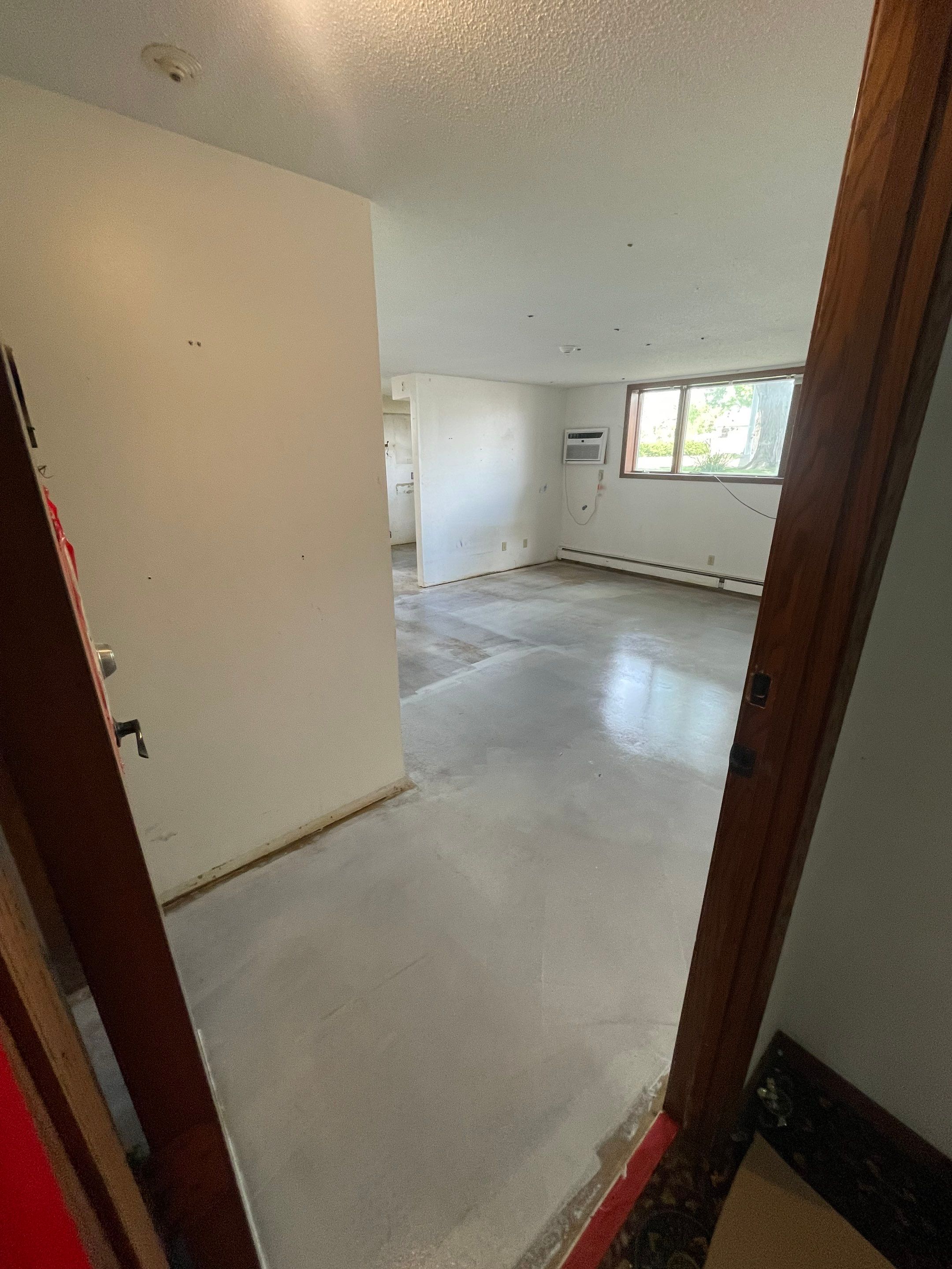 Commercial Subfloor Preparation and Flooring Restoration in Sioux Falls by Select Painting, Coatings & Garage Cabinets