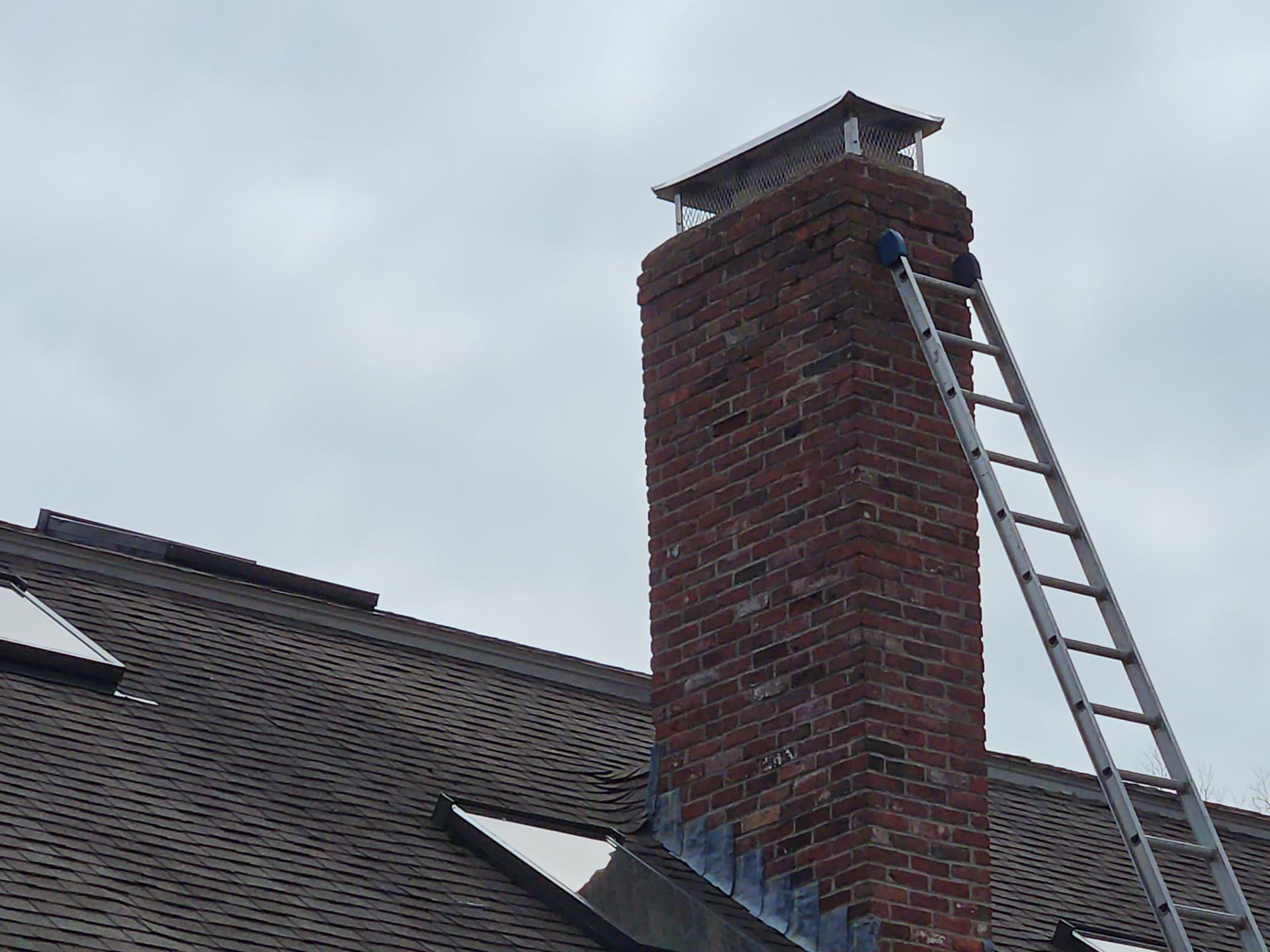 Chimney Cap by Master Roof by Master Roof Inc