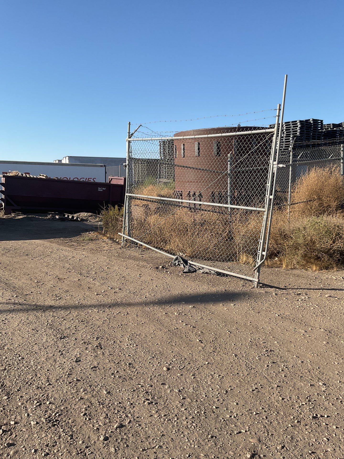 Commercial Chain-Link Double Drive Gate Repair by Fence Guys Inc.