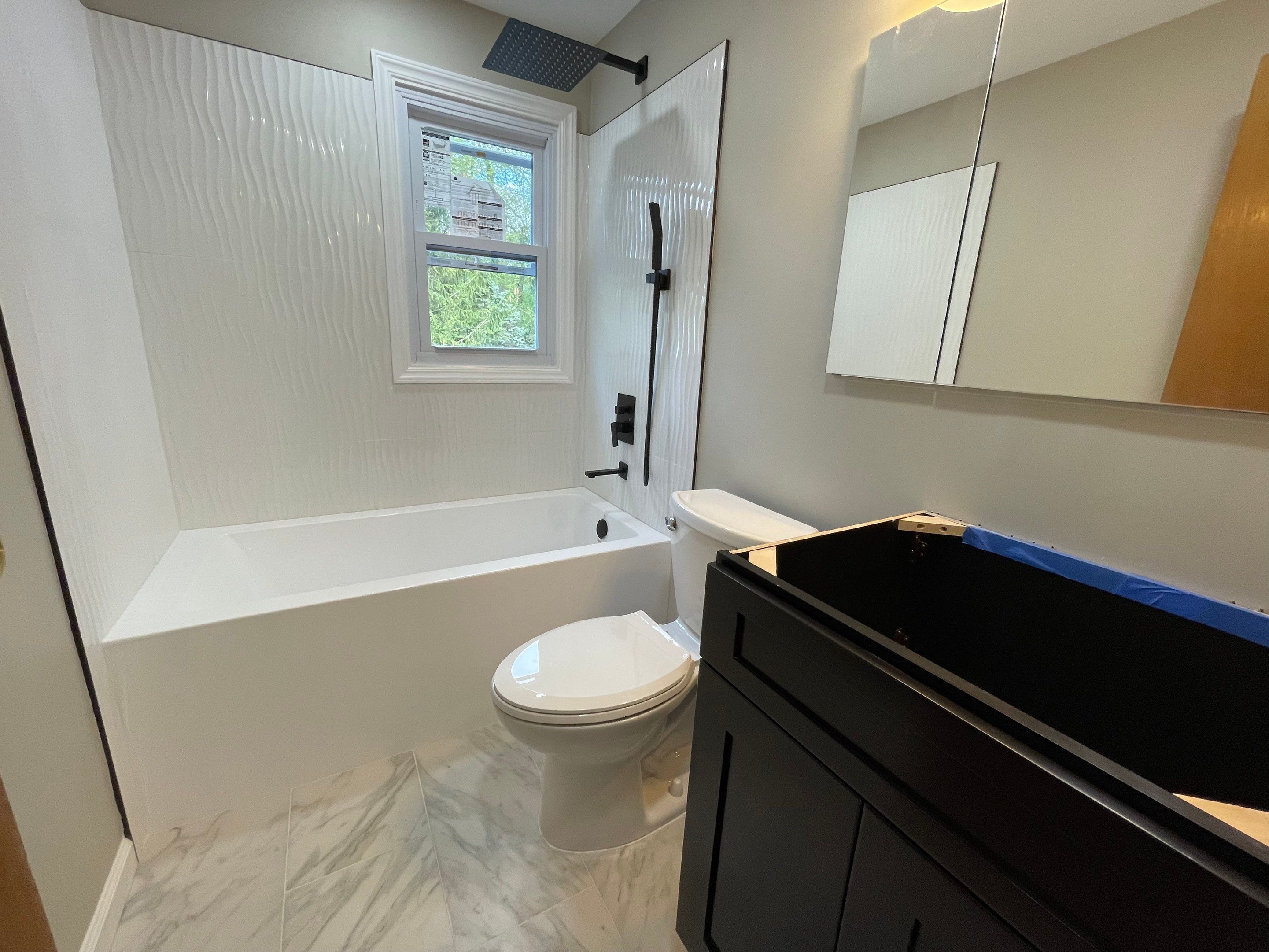 Bathroom Remodel using Tile by Home Concepts Construction