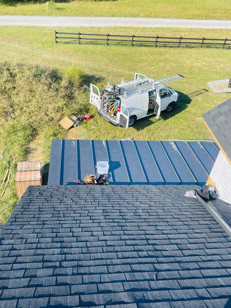 Residential Roofing Installation using Tamko Heritage AR with Standing Seam Metal Porch by Undersun Roofing 