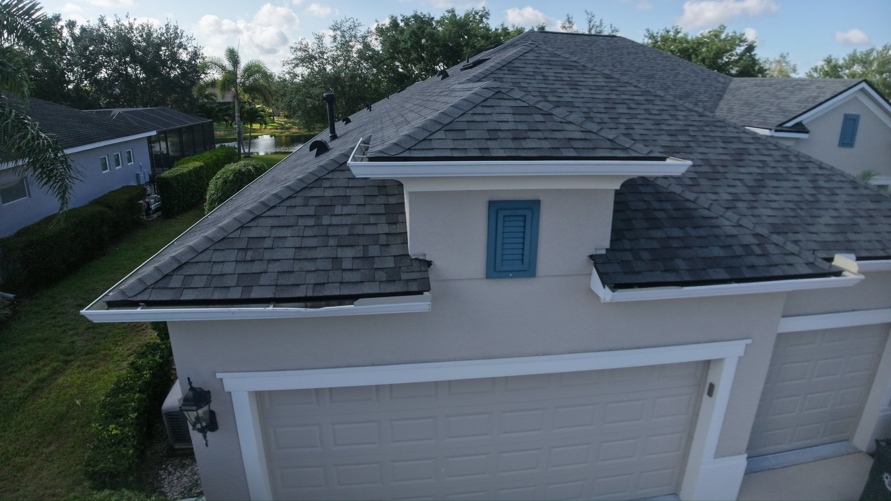 Residential Roof Installation With Estate Grey Architectural Shingles in Bradenton by Trinity Restoration and Roofing LLC