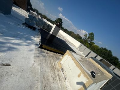 Waterproofing AC Curb covered courtyard on a flat Roof 