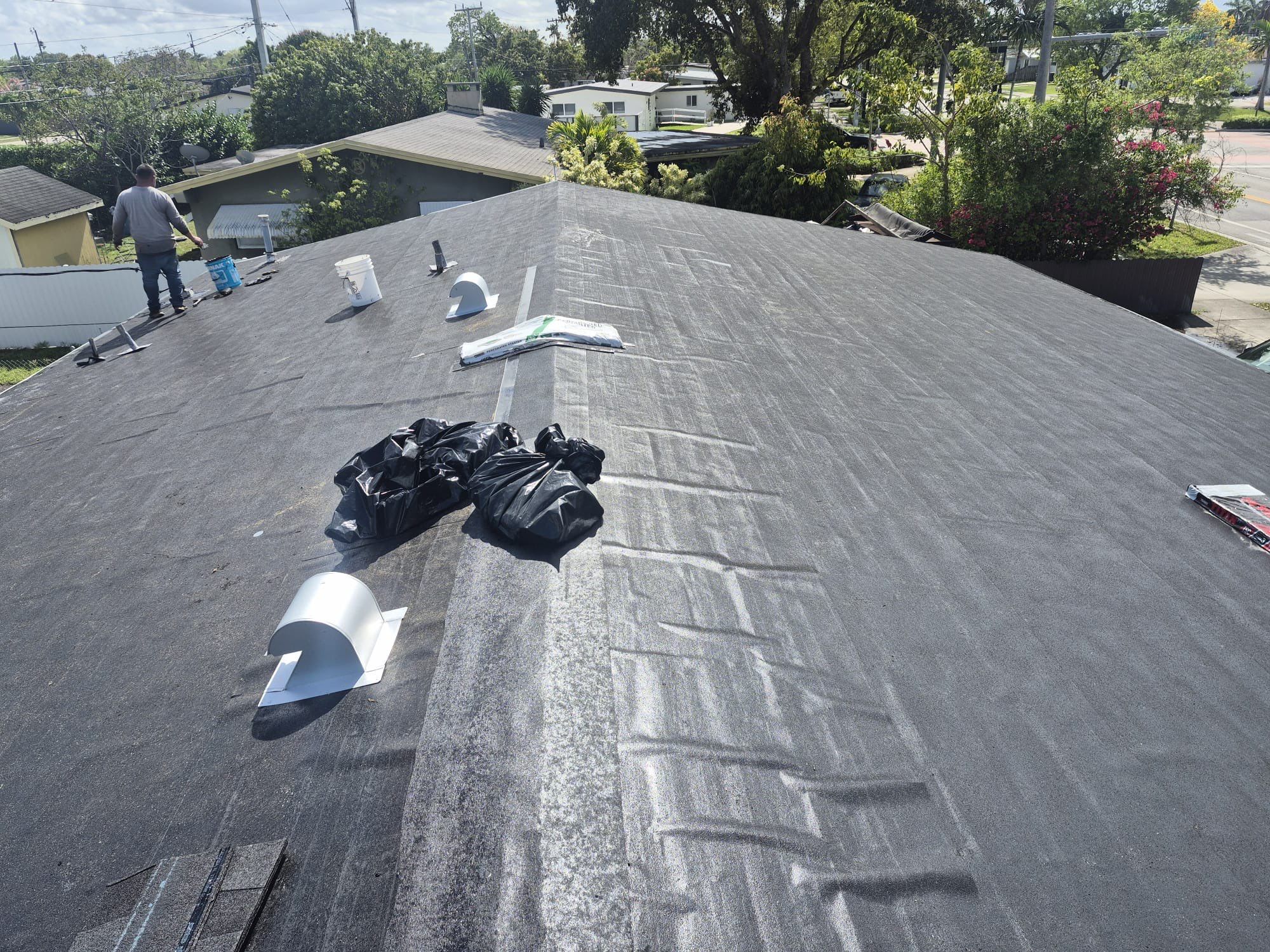 Comprehensive Roof Replacement and Flat Roof Installation in Cutler Bay by Art's Roofing & Construction