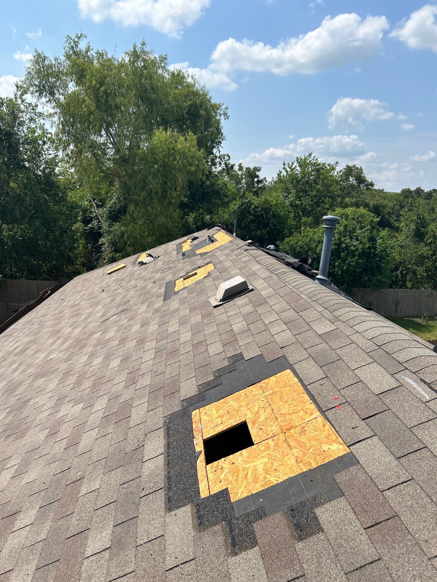Hail Damage using Owen's Corning Duration (Lifetime) Shingles by Roof Repair Company