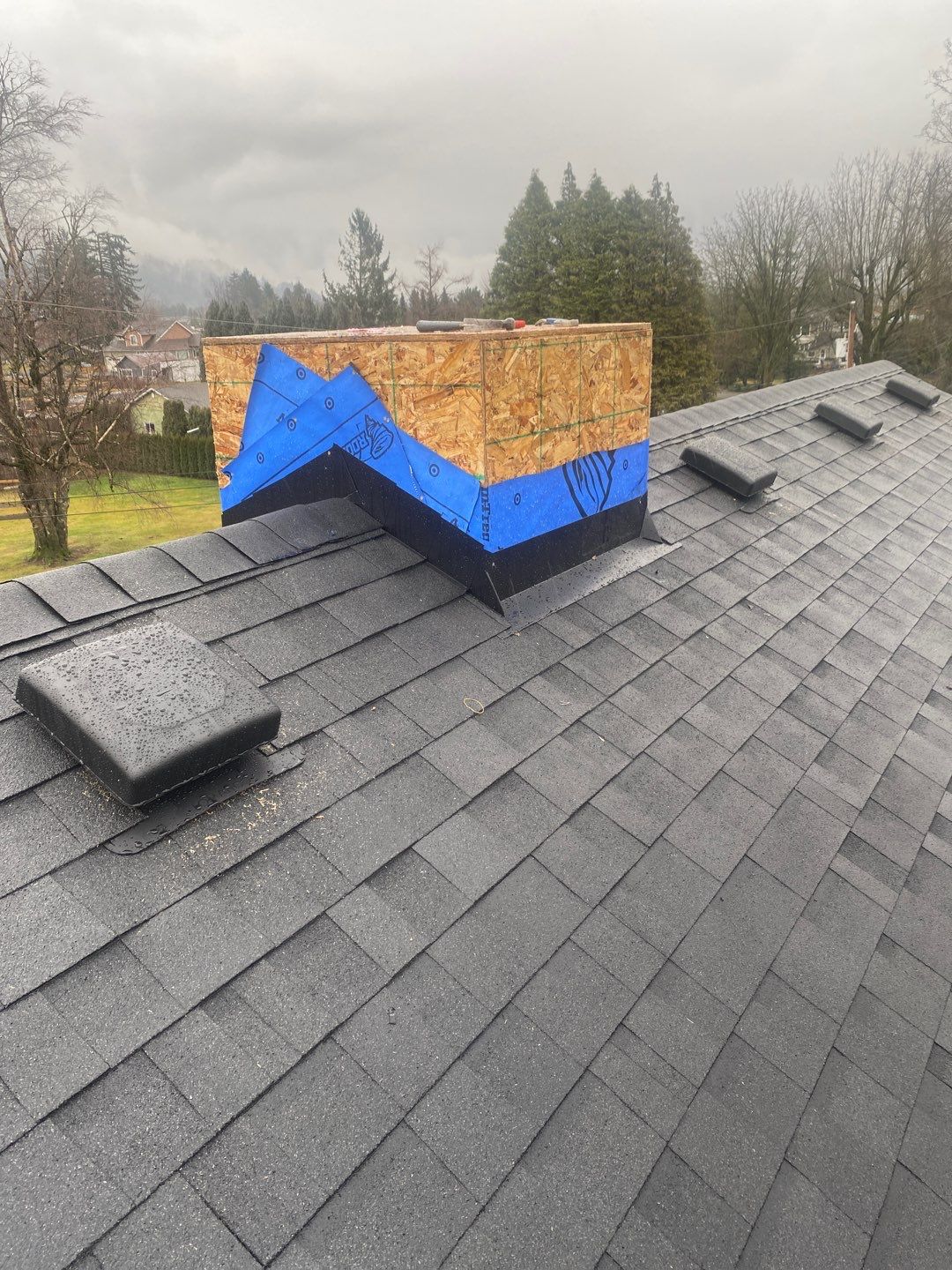Residential Roofing Installation using 16" Prolok metal and Owens corning shingles by Top Notch Roofing Inc