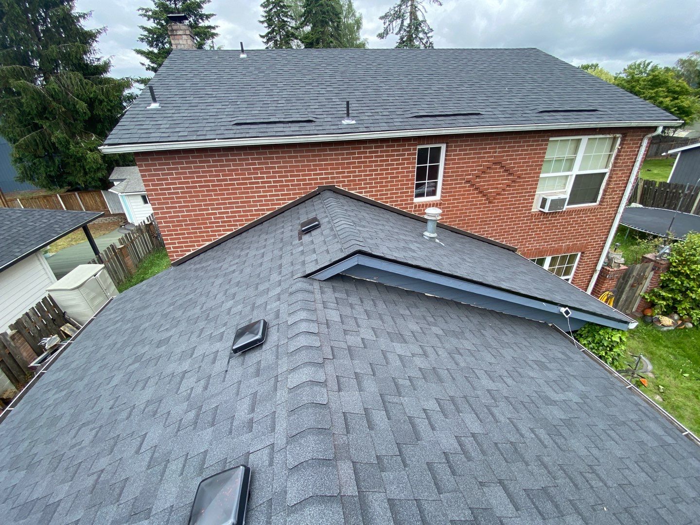 Estate Gray Shingles by Reimagine Roofing