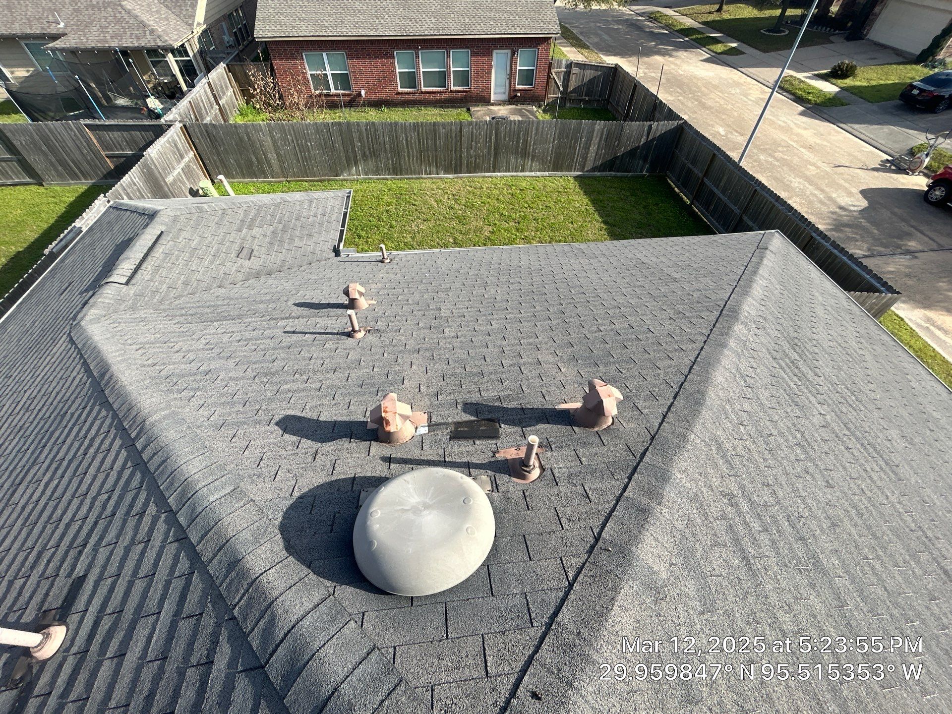 Reroof and Gutter Project in Houston by Roofing Technologies Unlimited