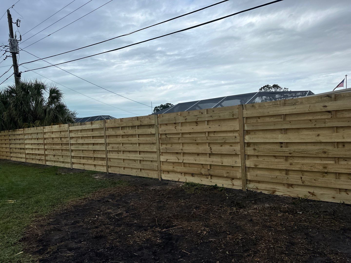 Wood Fence Installation using 6Ft Tall Pressure Treated Wood Privacy Fence by Asap fence and gates, LLC