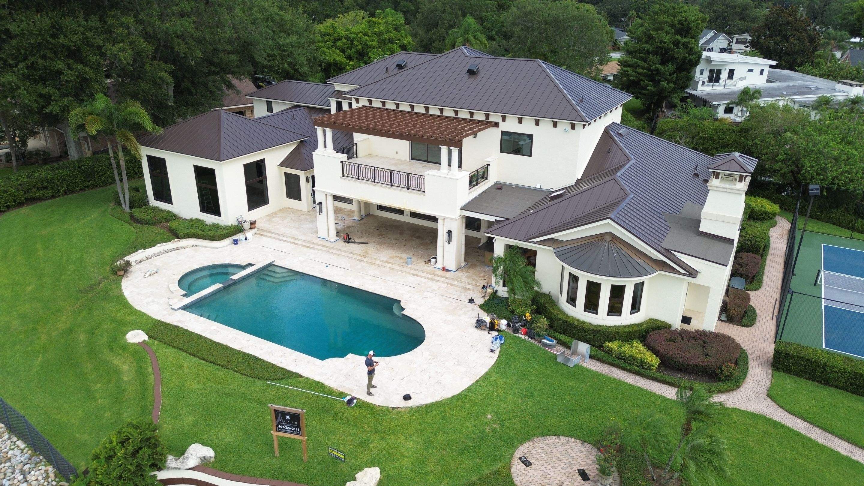 Standing seam metal roof on Lake Conway FL by Gold Key Roofing