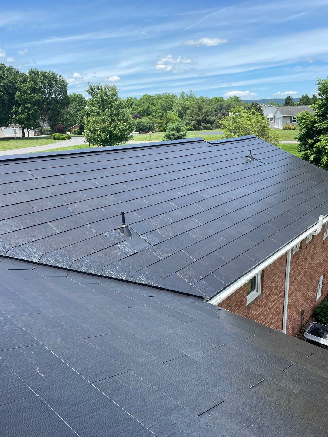 Tesla Solar Roof Installation by American Home Contractors