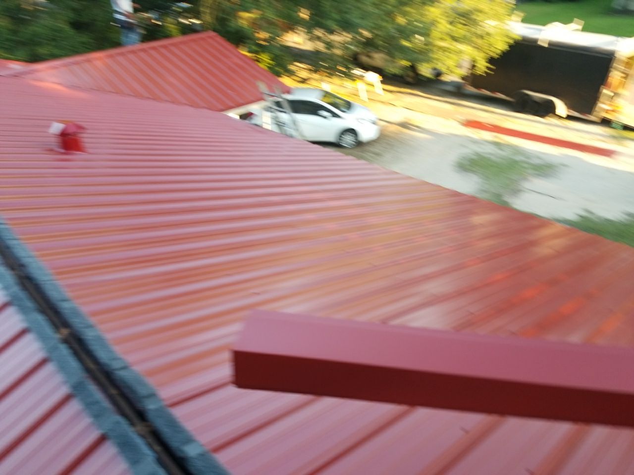Residential Roofing Installation using Metal roofing by American Roofing & Construction LLC