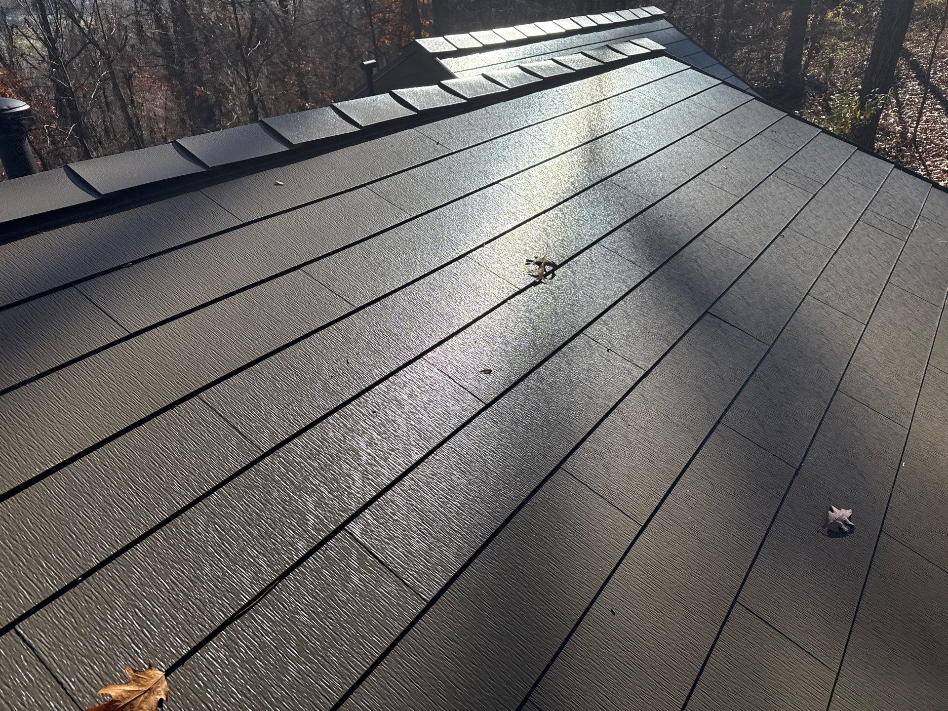 Roof replacement using GAF TimberSteel by American Home Contractors